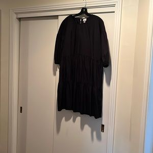 A new day x target.  Black cotton tiered mini dress with pockets- pull on style.